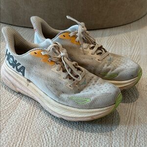Hoka Neutral Running Shoes in Light Gray with Lime and Yellow Accents